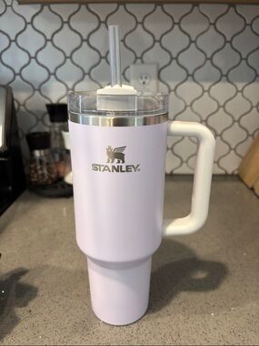 Stanley Pale Lavender Travel Mug with White Handle and Clear Lid